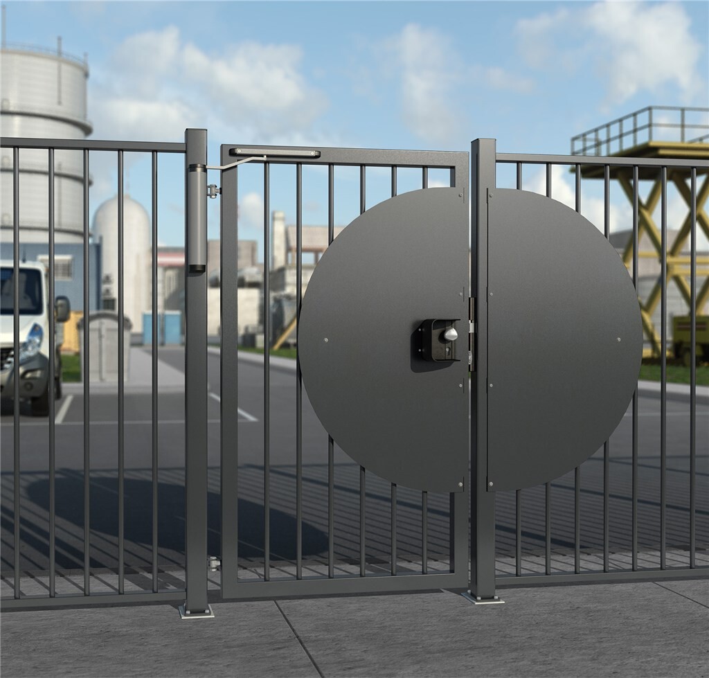 Security shroud for surface mounted locks with free exit configuration Security shroud for surface mounted locks with free exit configuration