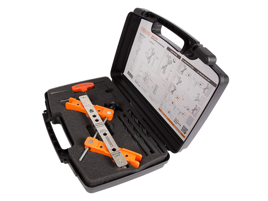 Tool case with drilling jig for surface mounted locks and corresponding keeps Tool case with drilling jig for surface mounted locks and corresponding keeps
