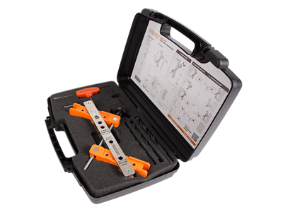 Tool case with drilling jig for surface mounted locks and corresponding keeps Tool case with drilling jig for surface mounted locks and corresponding keeps