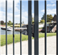 Surface mounted gate lock